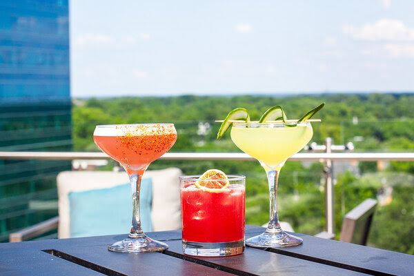 Rooftop Bar Offers Cocktails Inspired by Red Hat Concerts